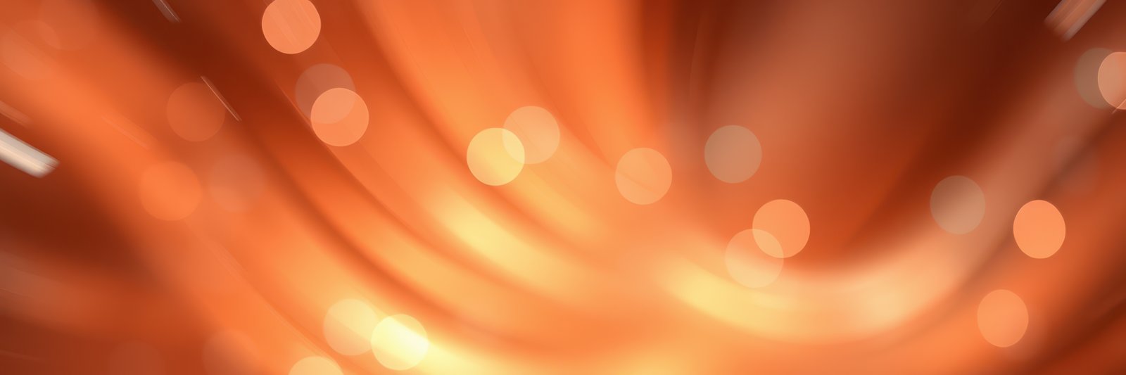 A close-up of a bright, orange light with a blurred background